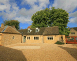 Bow House Cottage in Bourton-on-the-Water, Gloucestershire, South West England Bow House Cottage in Bourton-on-the-Water, Gloucestershire, South West England